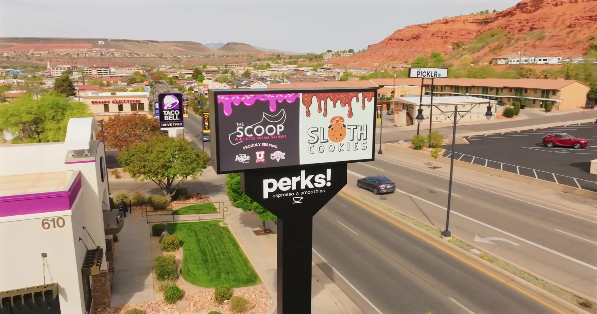 Scoop Ice Cream, Sloth Cookies, and Perks Coffee storefront