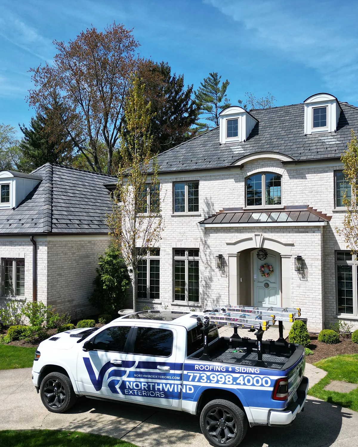 Premium exterior home renovation with roofing and siding