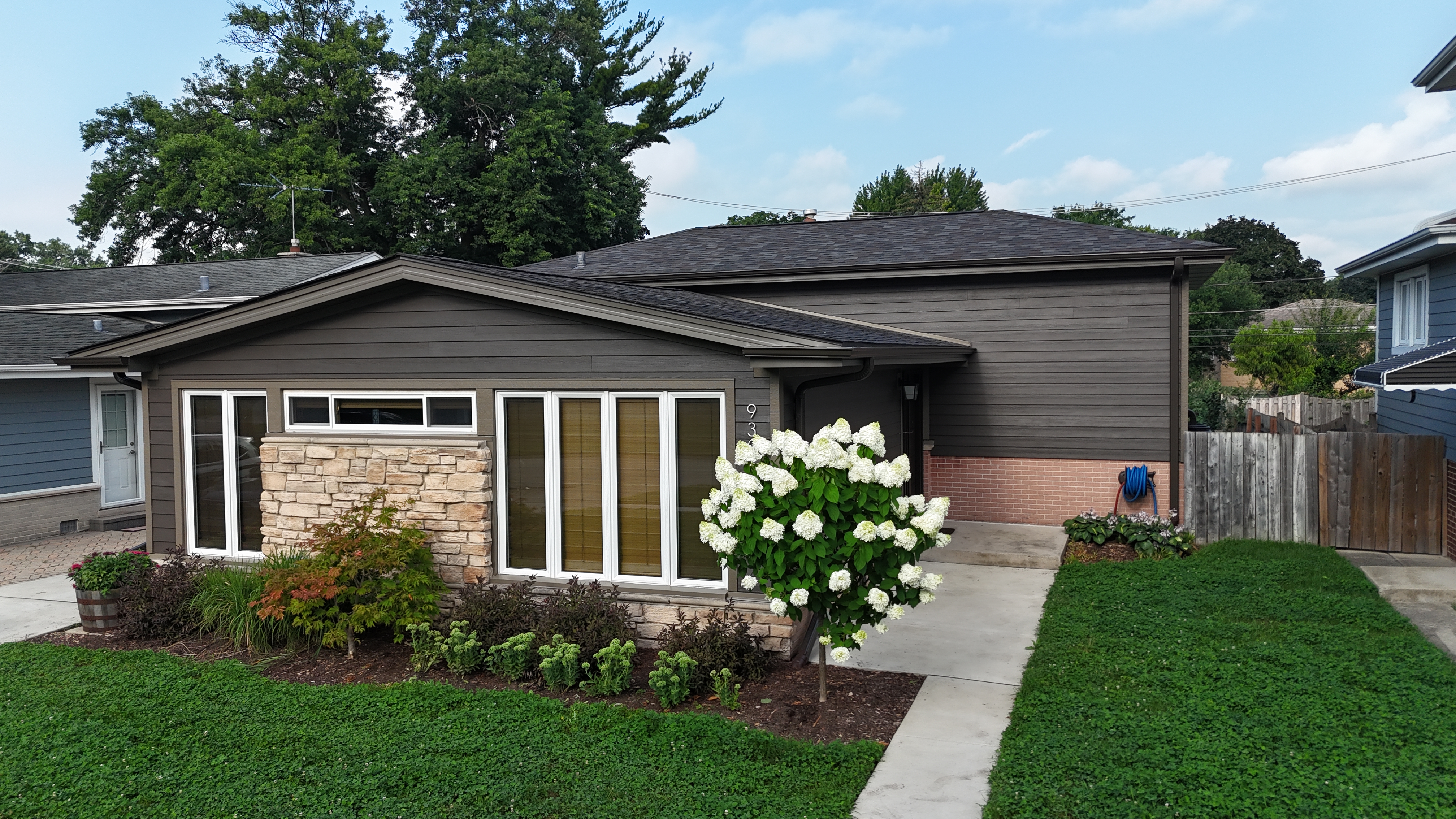 Rich Espresso lap siding exterior transformation
