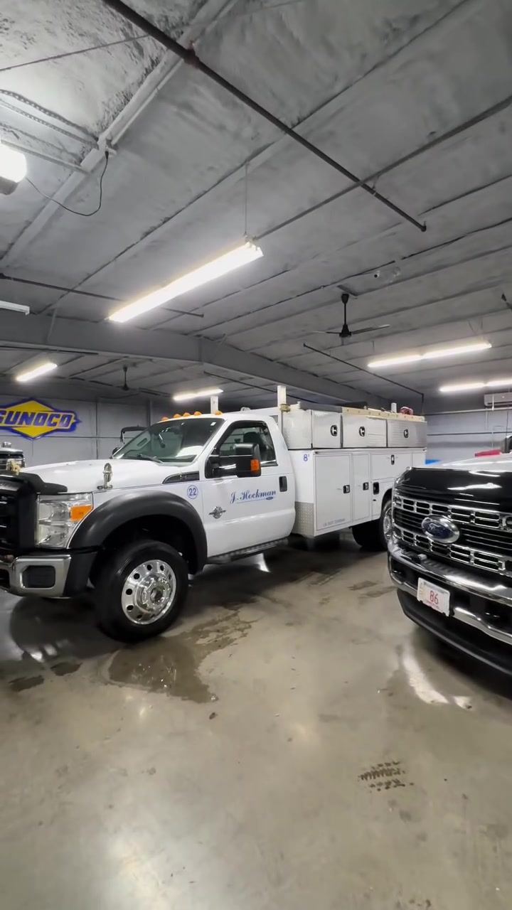 Ford F-450 and F-550 service trucks in the shop