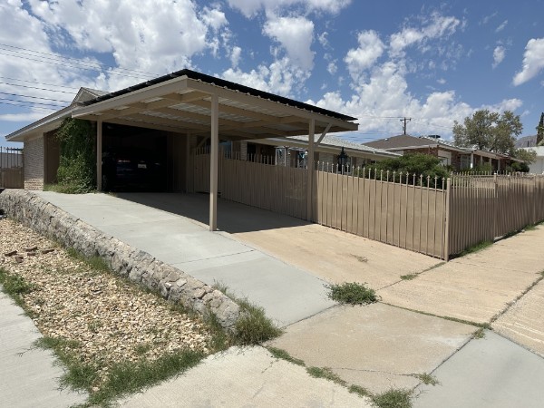 Metal patio cover and front yard