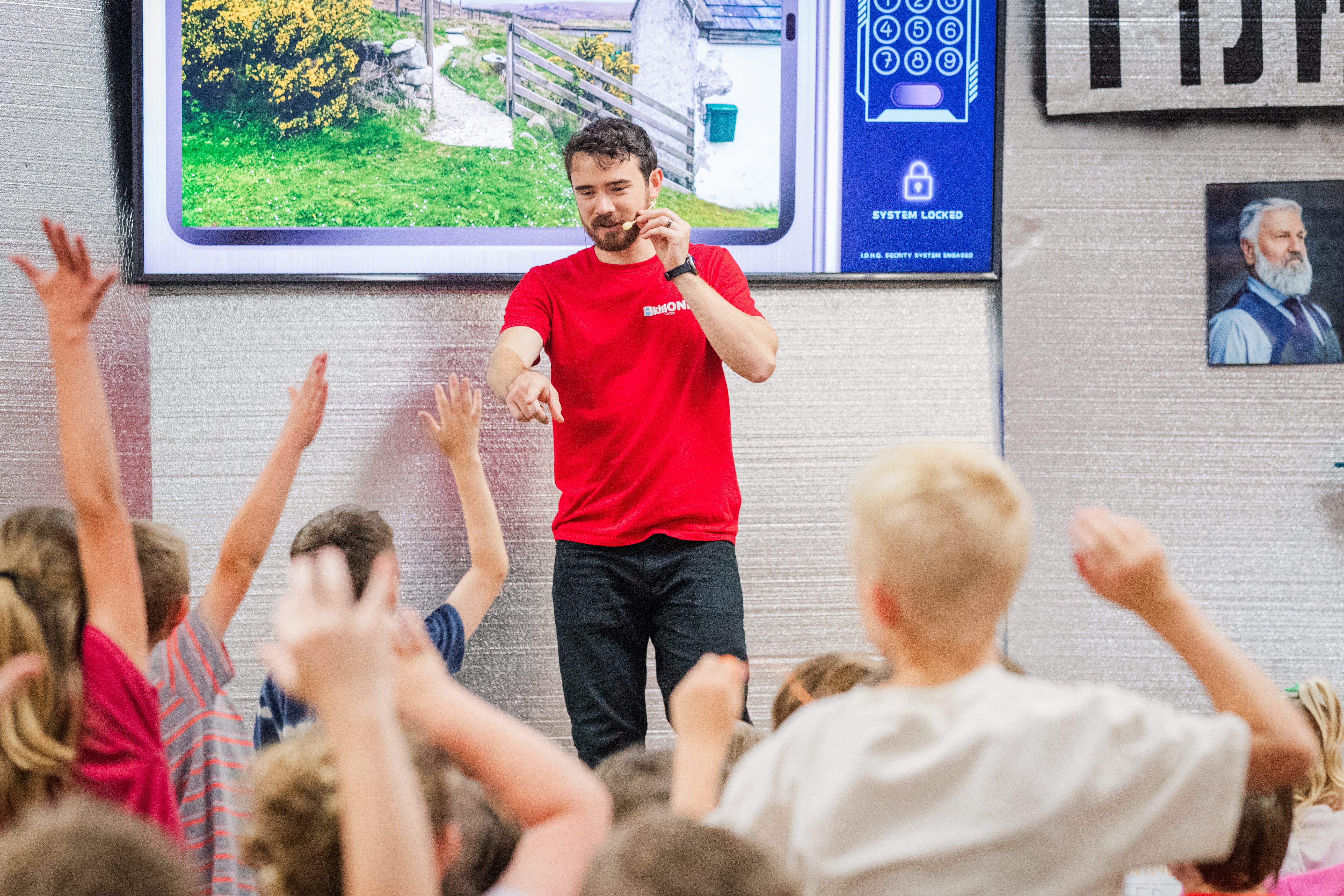 Ezra teaching kids at a KidONE apologetics camp