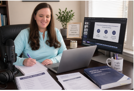 Jeanese Ex, RN, BSN, nurse educator smiling while writing notes at a desk with a laptop, podcast microphone, course outline, nursing textbook, and a monitor displaying course slides Jeanese Ex, RN, BSN, nurse educator smiling while writing notes at a desk with a laptop, podcast microphone, course outline, nursing textbook, and a monitor displaying course slides