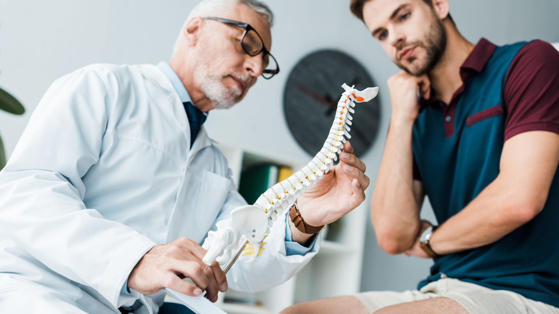 Chiropractor explaining information to a patient