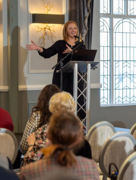 Ashleigh Watson of Copper Square speaking to a business audience