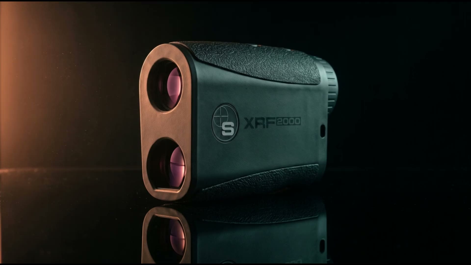 Sabre XRF 2000 laser rangefinder on a dark stage