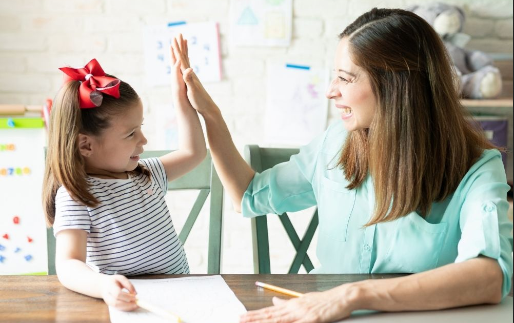 Parent and child learning together at home