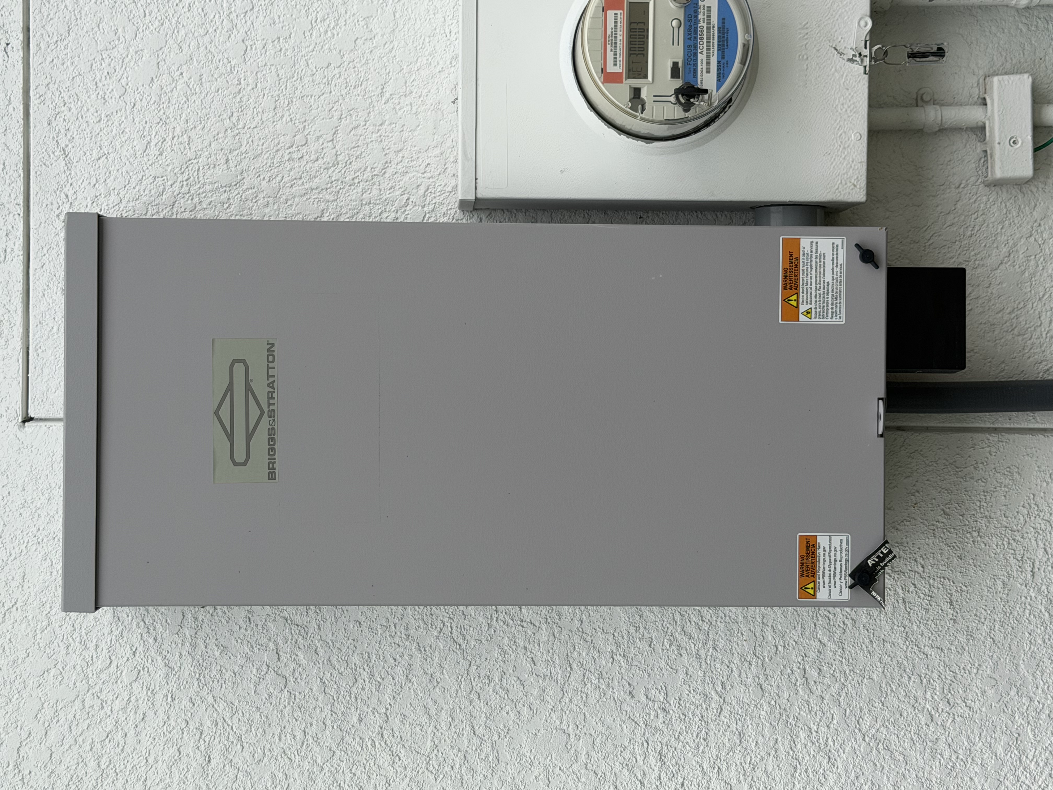 Residential Briggs automatic transfer switch electrical panel serviced by Power Safe Generator