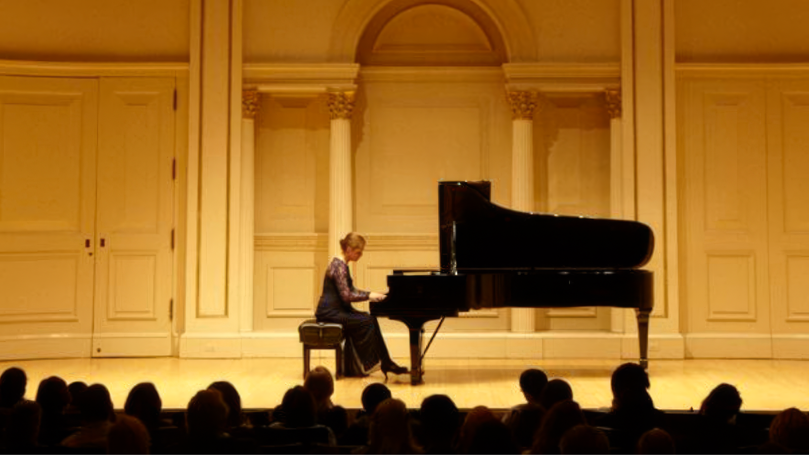 Rebecca Bogart performing on stage at Carnegie Hall