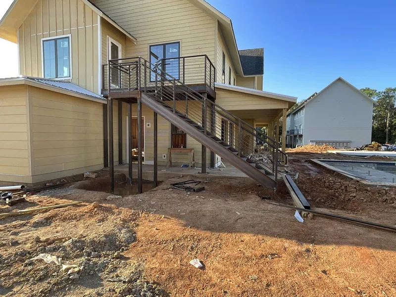 Steel exterior stair and landing on a new multi-family building