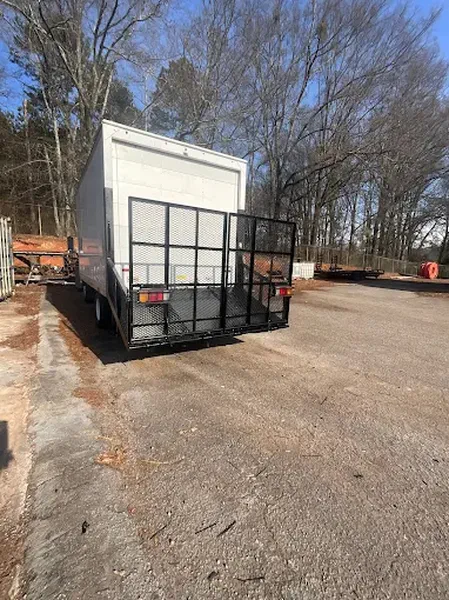 Enclosed box trailer fitted with a mesh steel rear gate