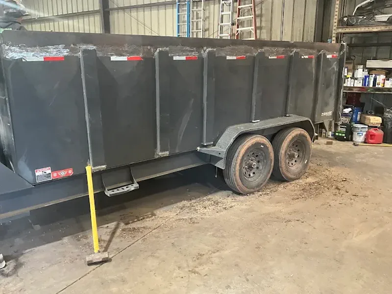 Tandem-axle dump trailer body built up in the fabrication shop