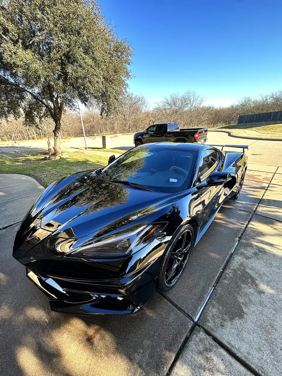 Black Corvette C8 with a mirror gloss after a detail in Dallas-Fort Worth
