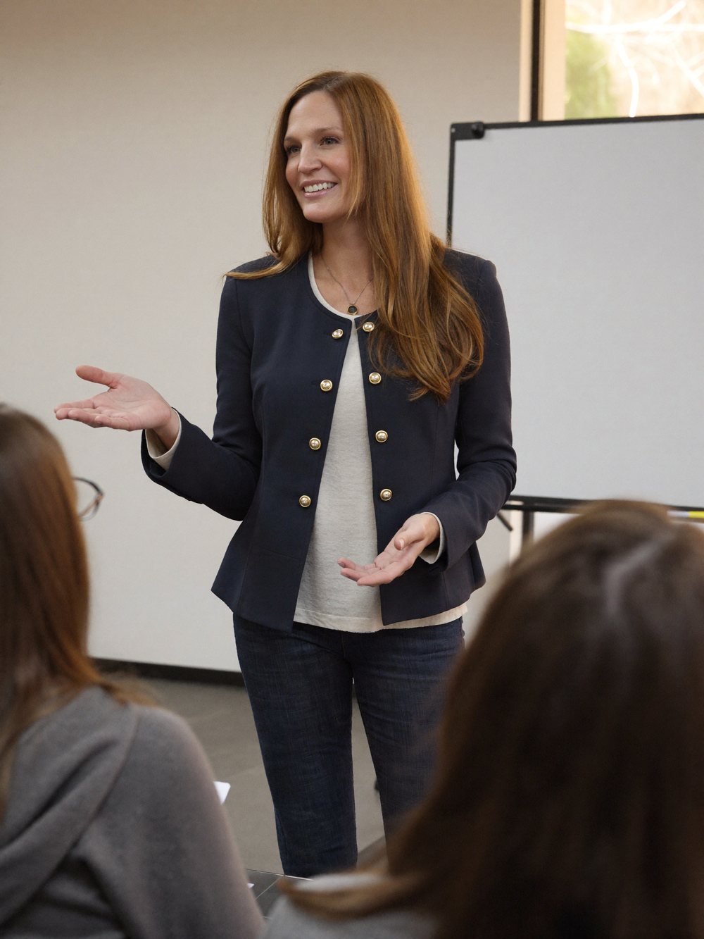 Laura Ivy Blessing teaching a room of real estate agents