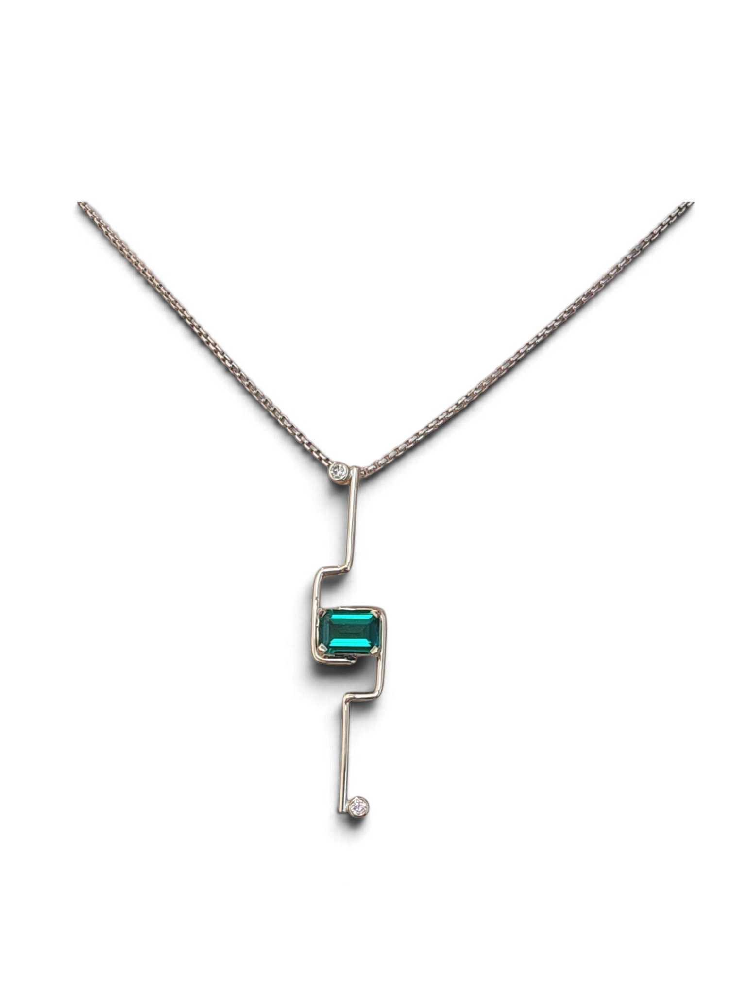 Modern emerald and diamond pendant