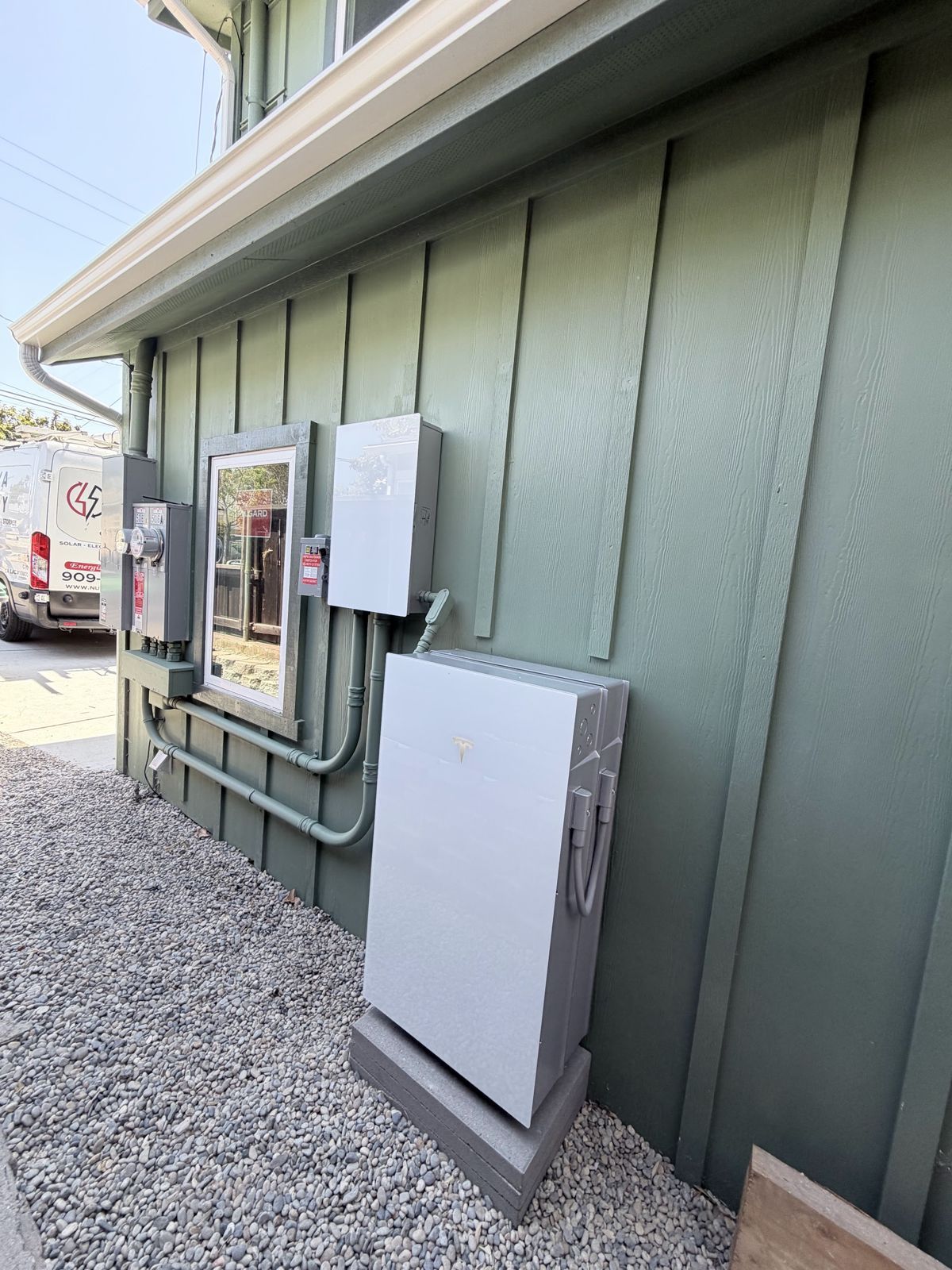 Powerwall and electrical install on a home exterior