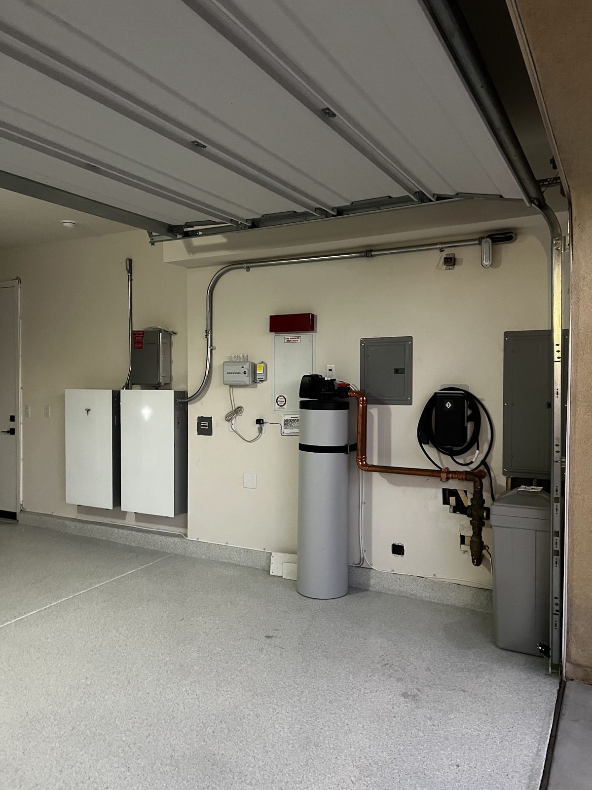 Tesla Wall Connector EV charger and Powerwalls installed by Nueva Energy