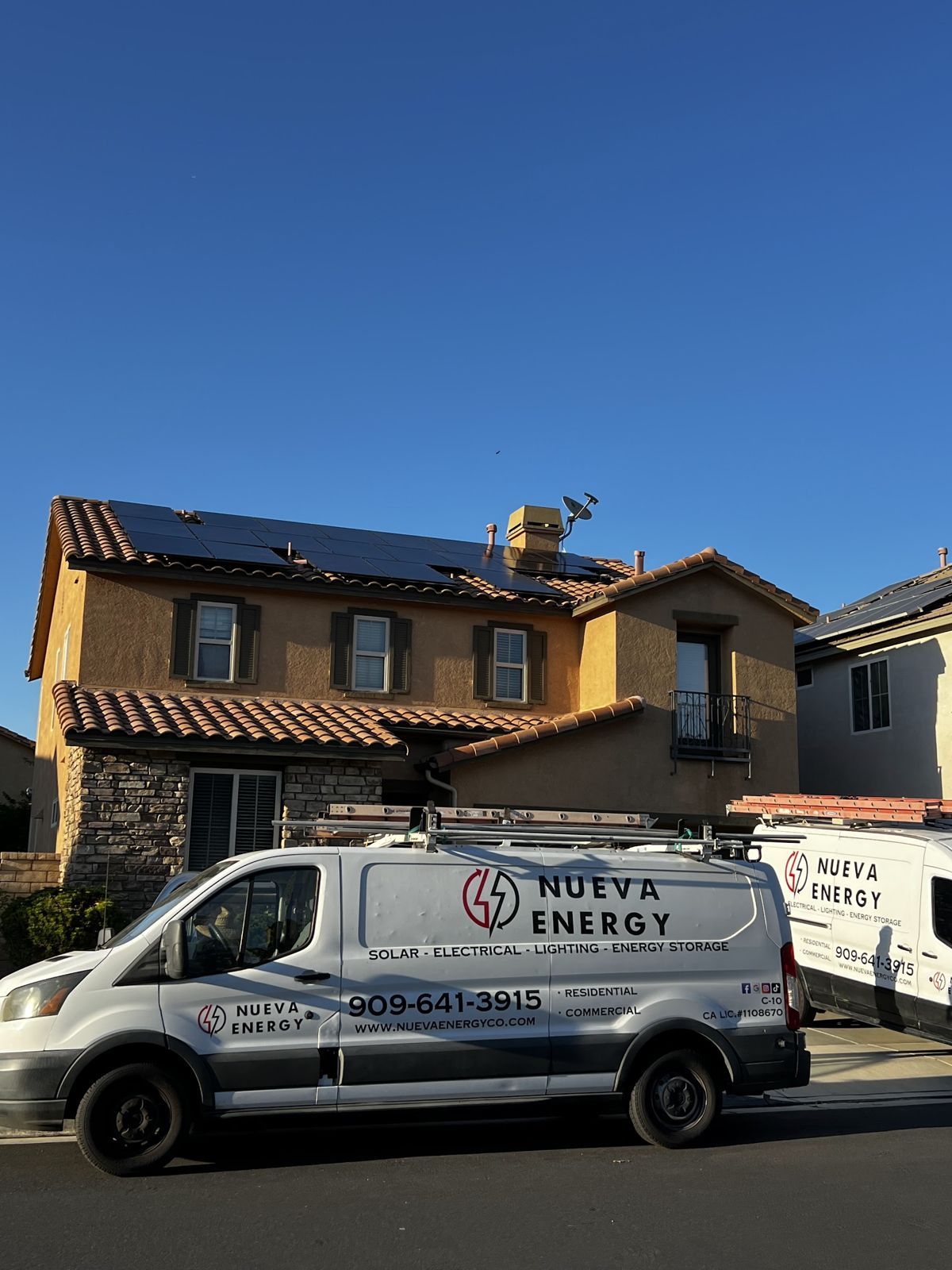 Nueva Energy work van outside a solar home