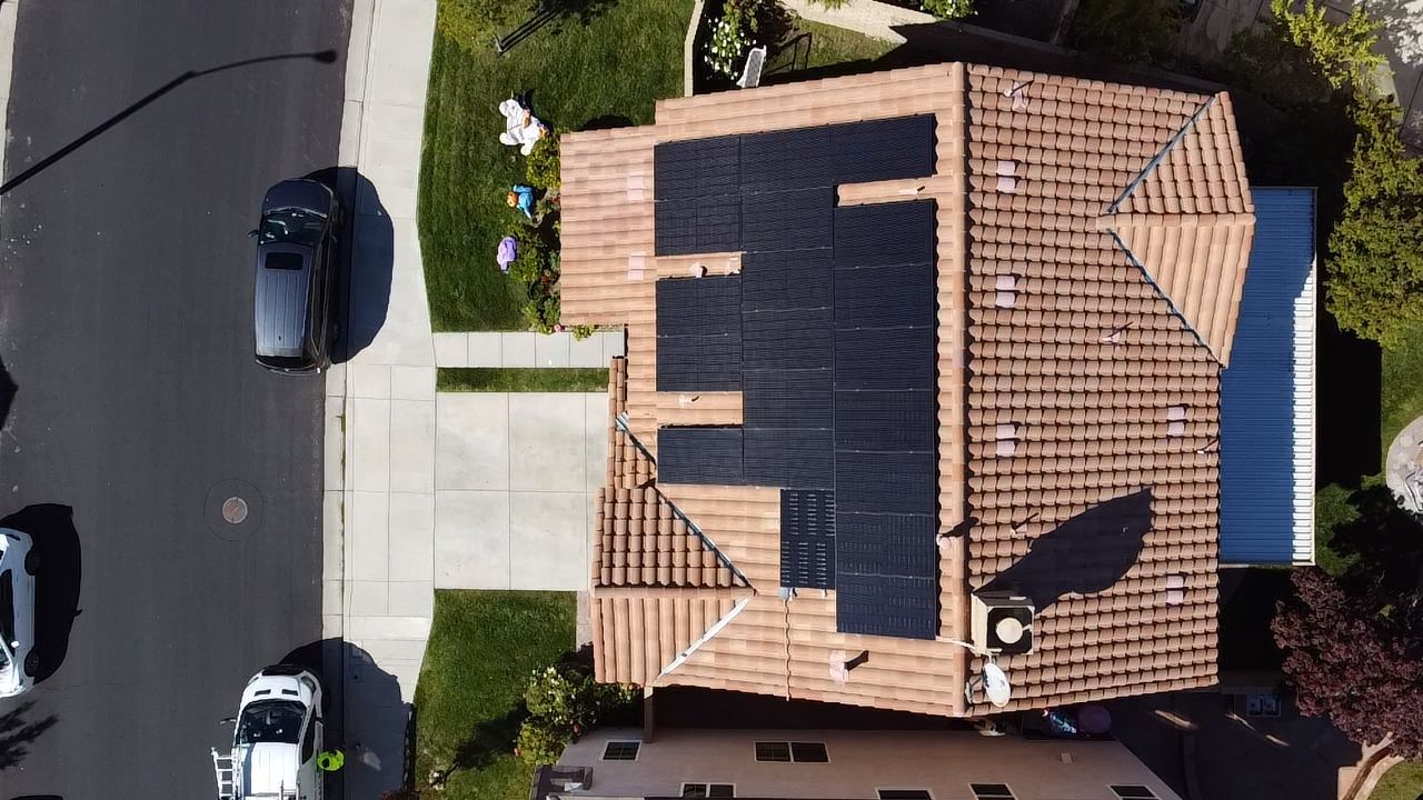 Solar panels on a tile roof, aerial view