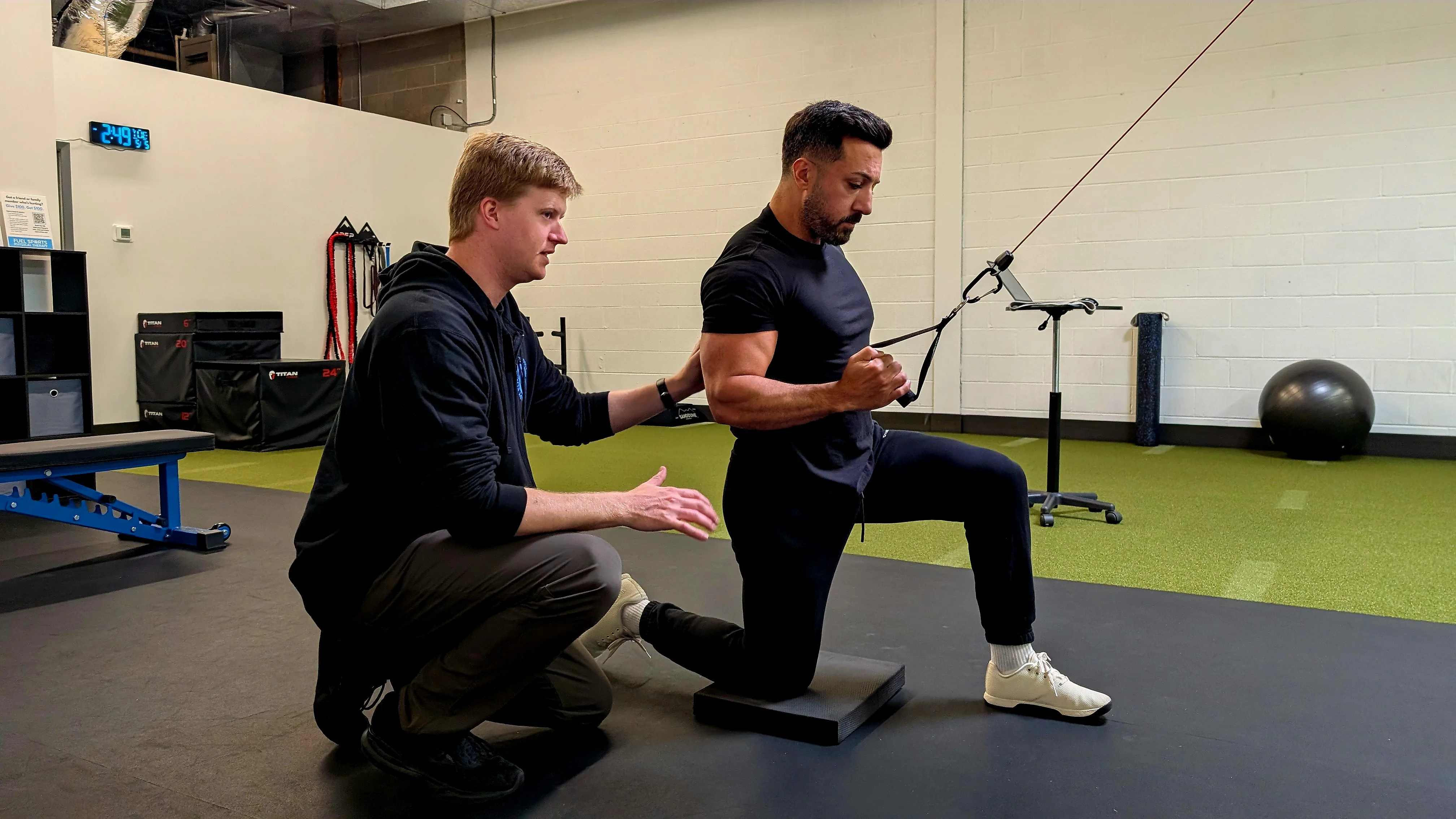 PT guiding cable shoulder exercise