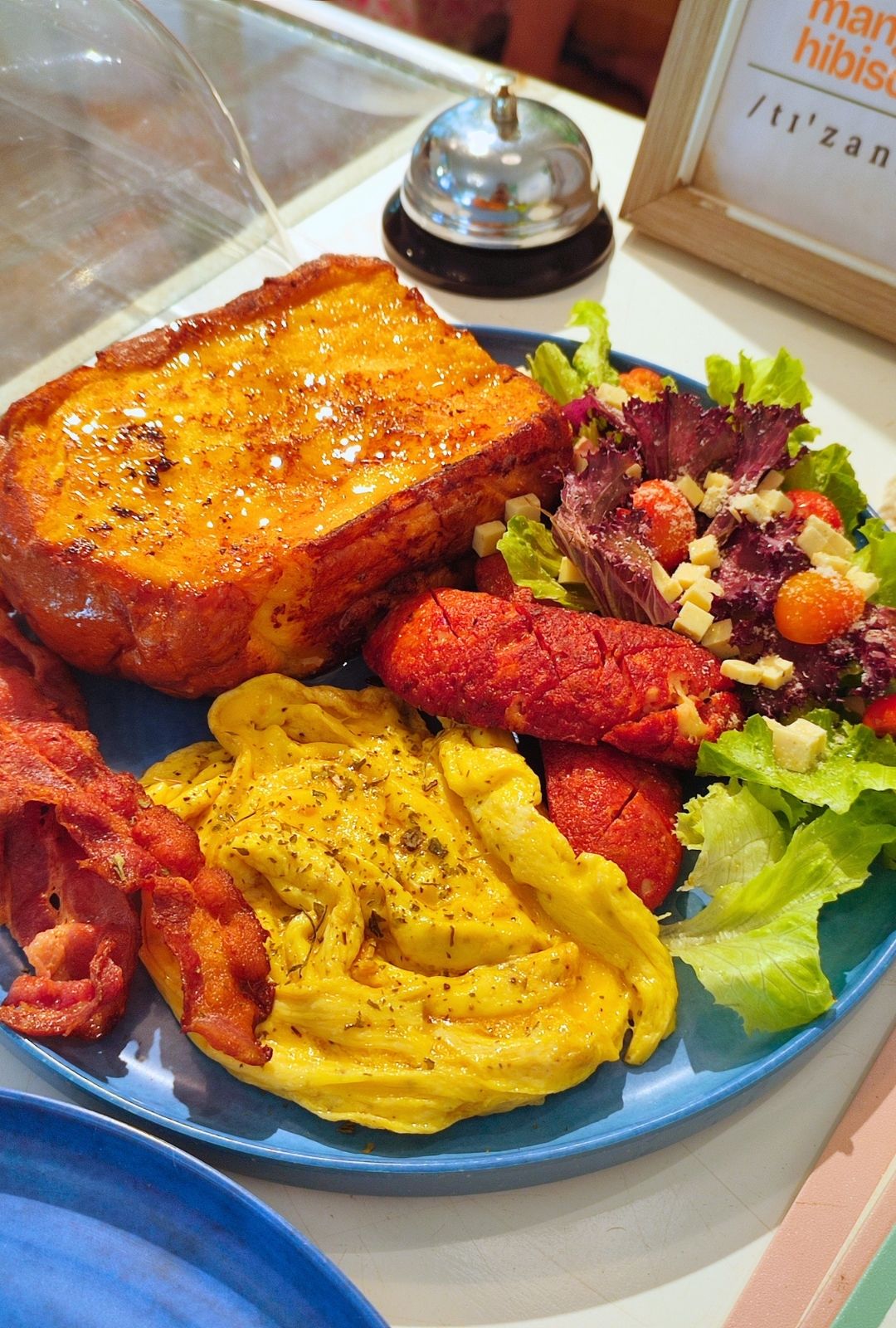 Breakfast plate with toast, eggs, and vegetables