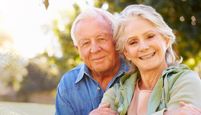 Happy senior couple protected by American Extra Help