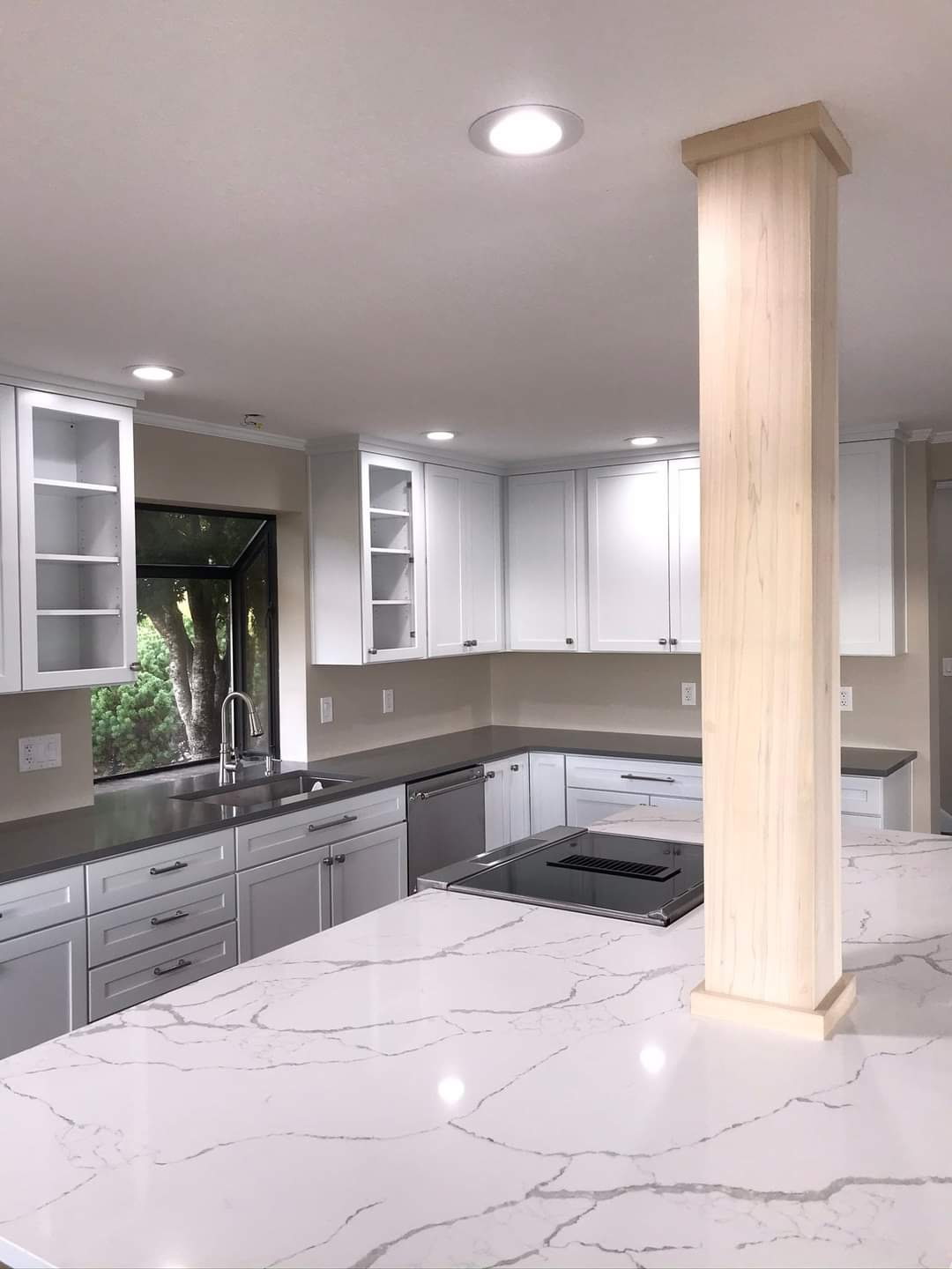 Kitchen remodel waterfall marble island