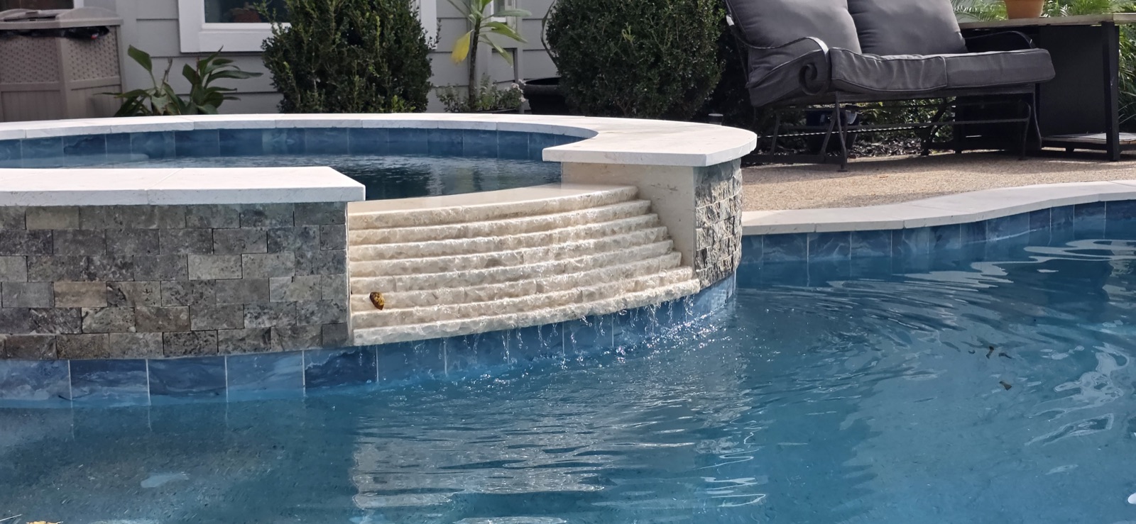 Pool with waterfall feature in Houston