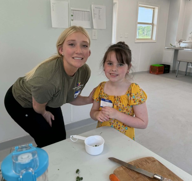 Coach Madison and Camper