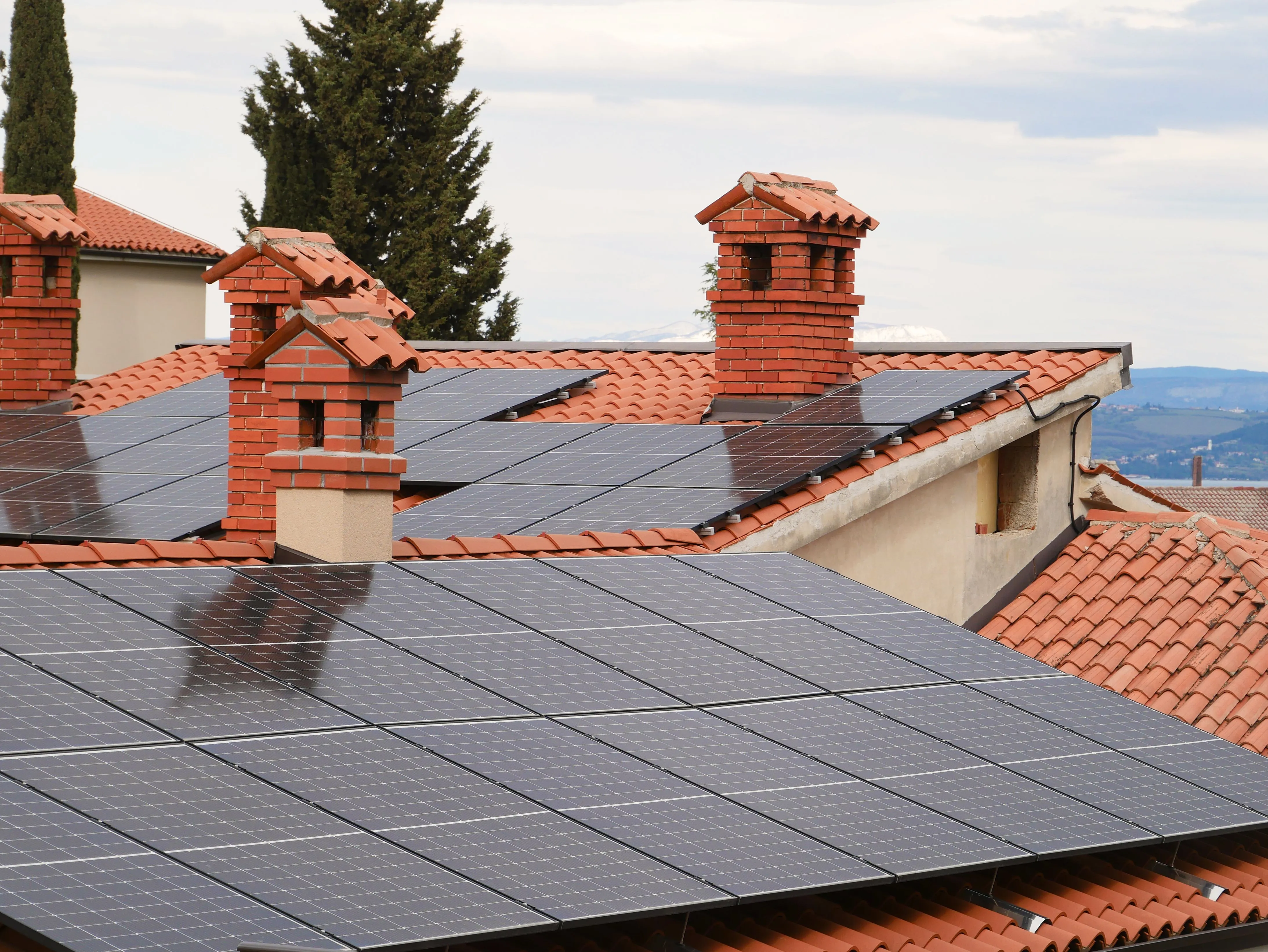Solar panels on a terracotta tile roof