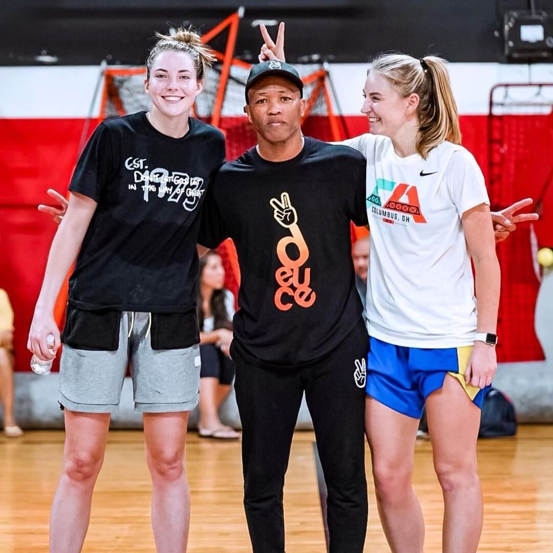 Coach B. Law giving individual instruction during a one-on-one basketball session