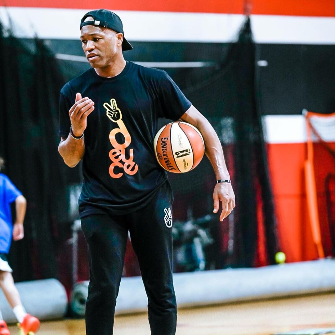 Coach B. Law reacting with surprise during a basketball session