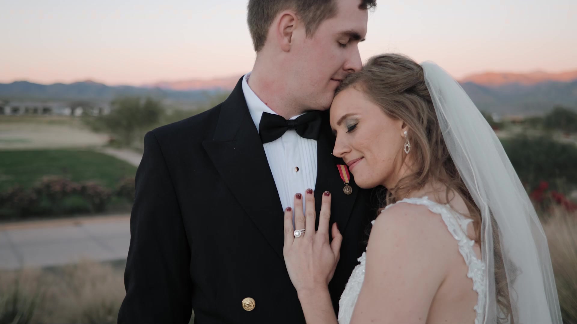 Couple embracing at a Sedona sunset