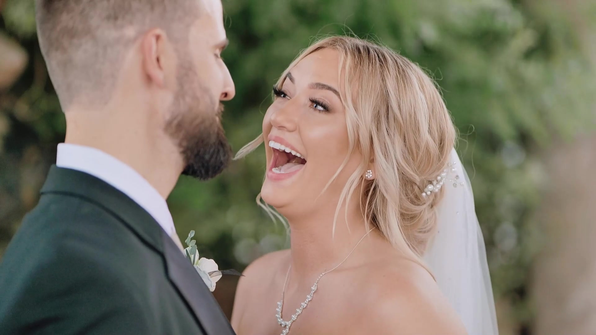 Couple's first dance under string lights
