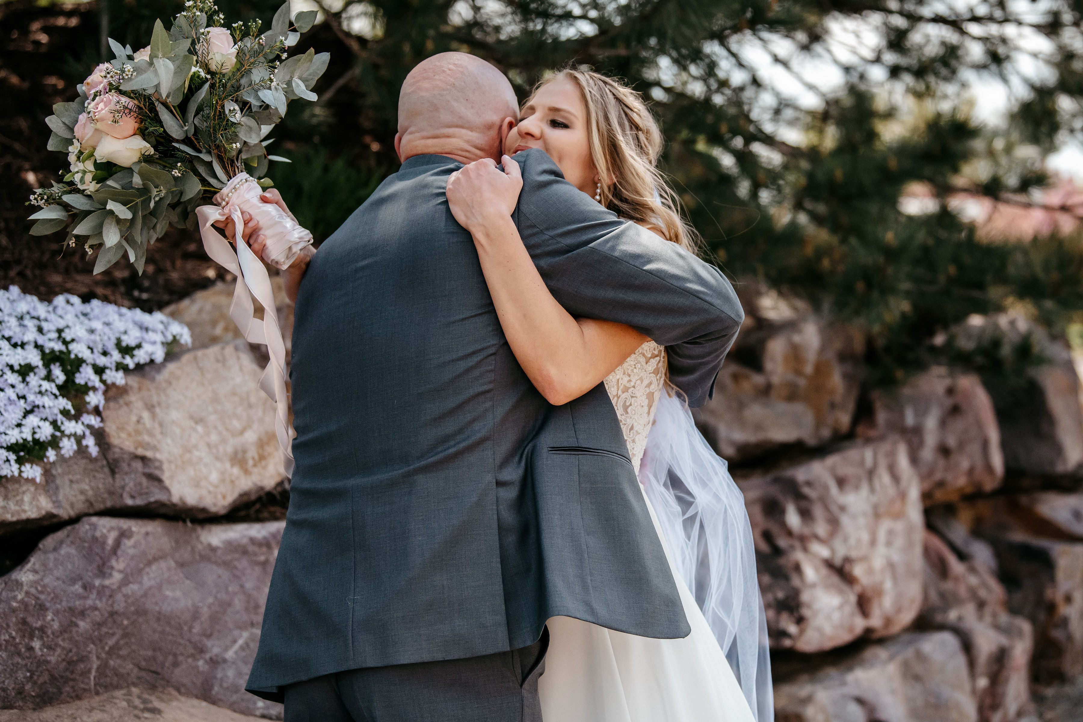 Couple embracing beneath a desert sky