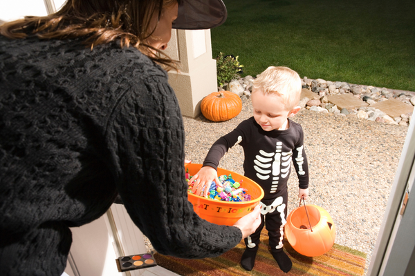 Kid getting candy Kid getting candy
