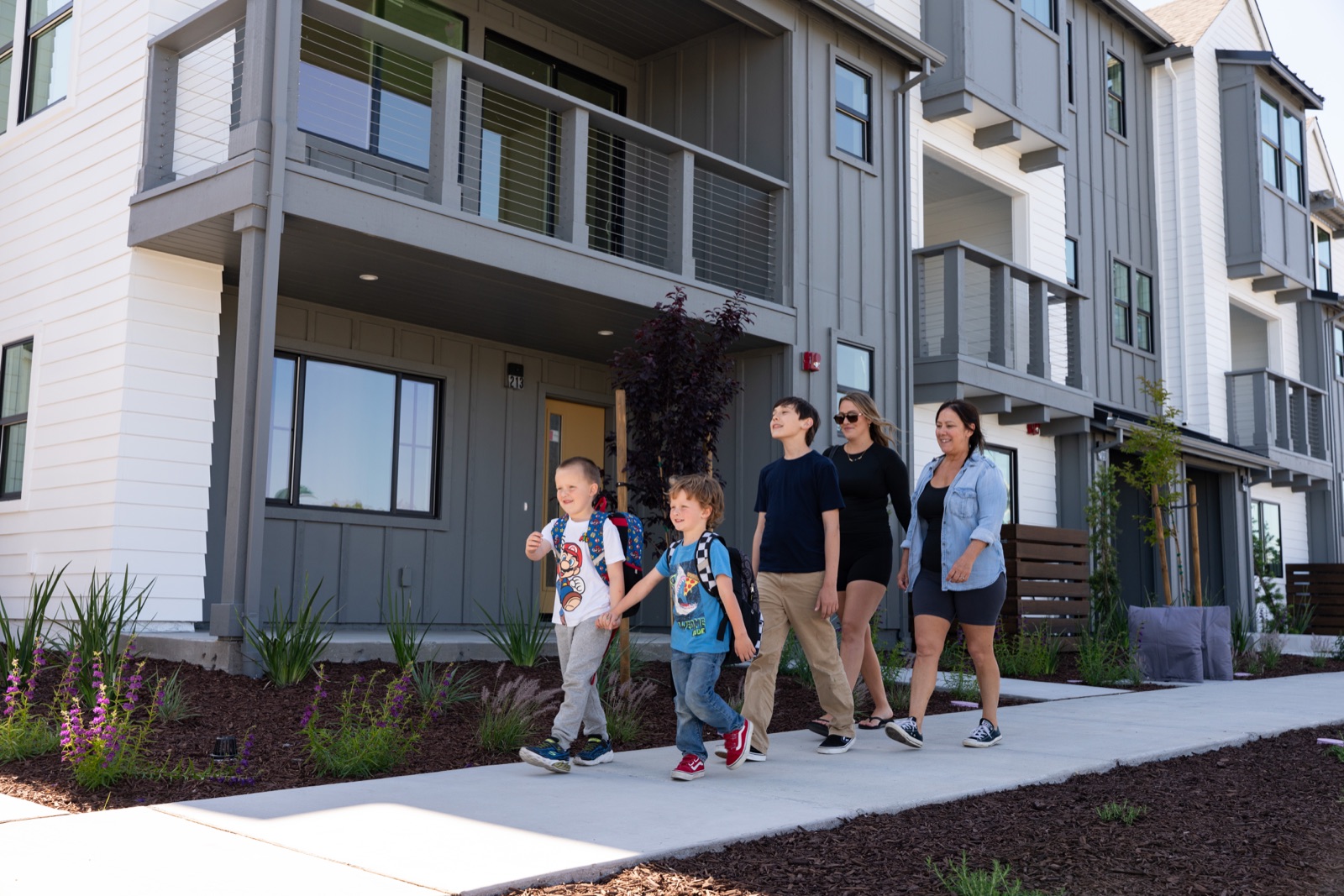 Family walking through SOMO Village in Rohnert Park