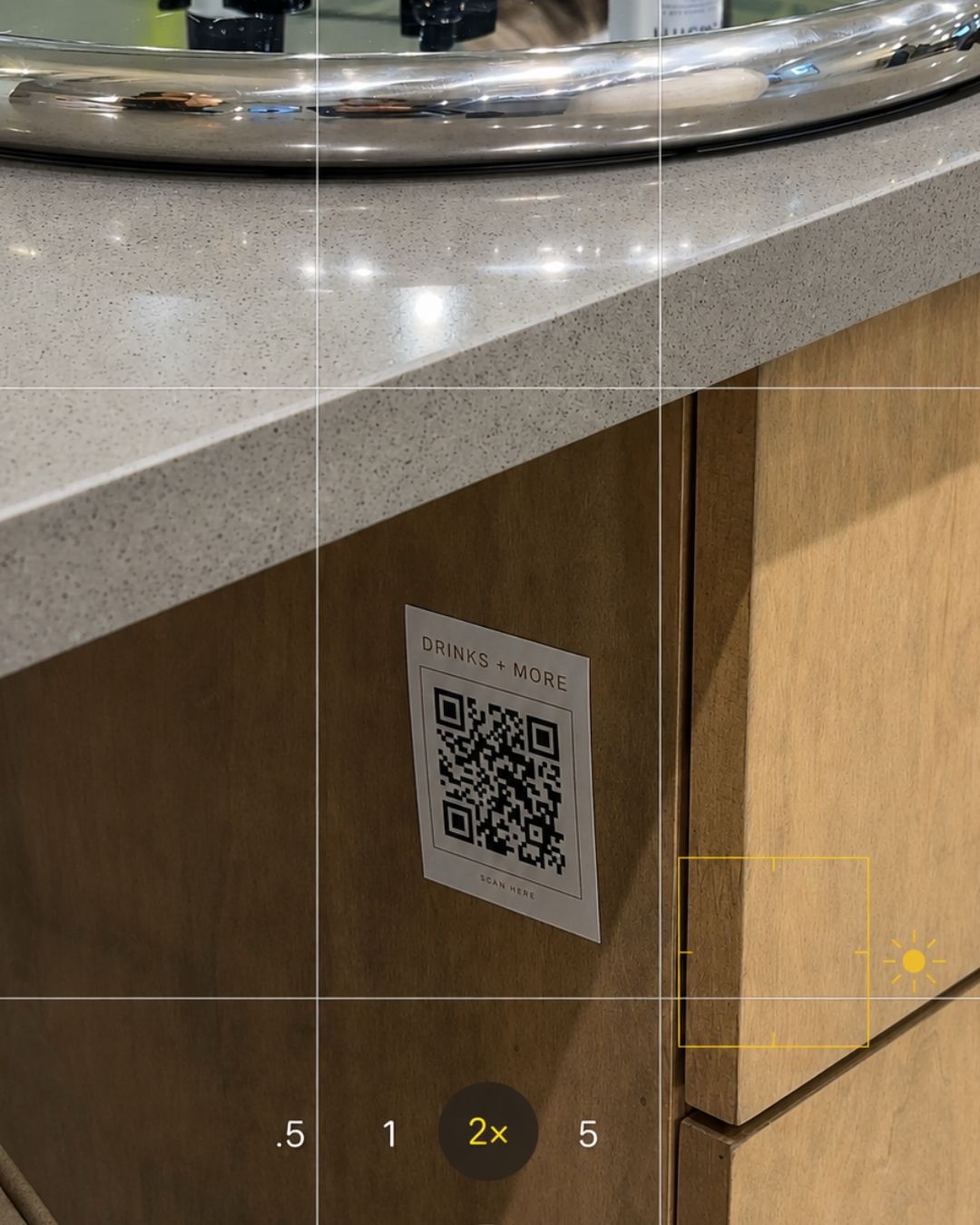 The Concierge On Call QR code sign at a salon station