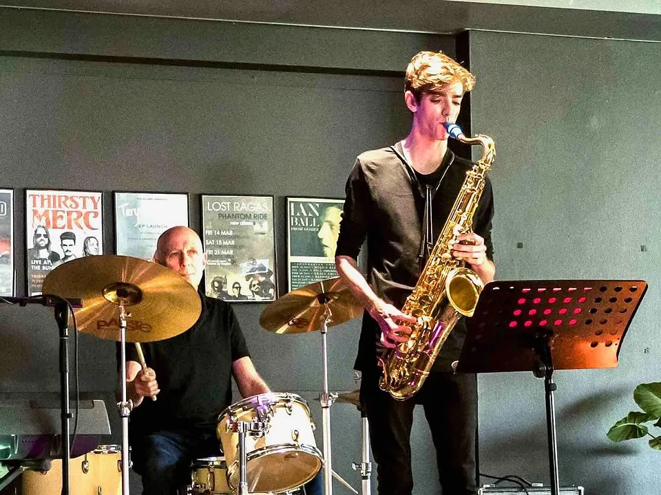 Saxophone and drums playing live jazz