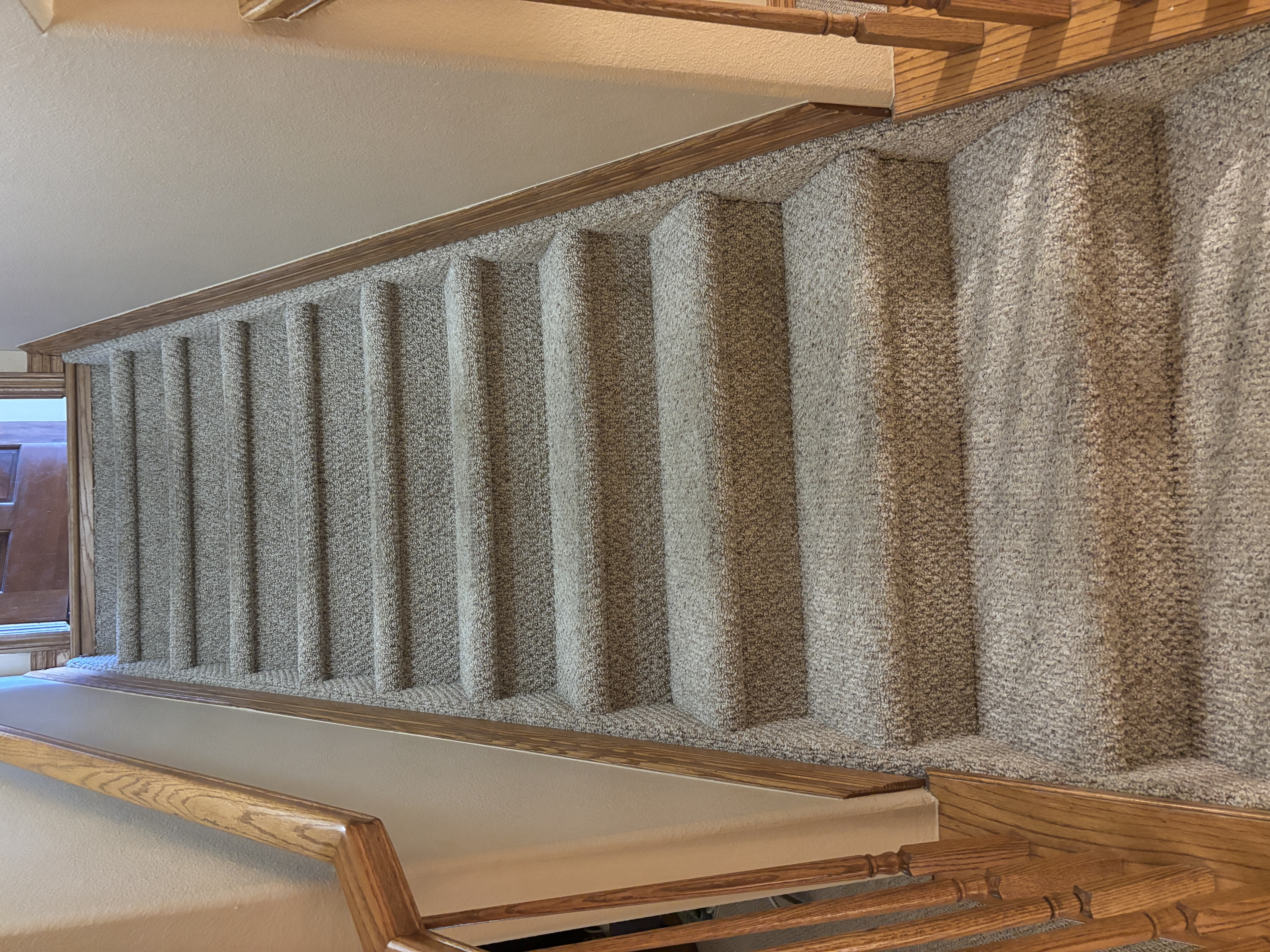 Carpeted stairs in a Sapphire Pointe home in Castle Rock, CO after sub-surface extraction for dog urine