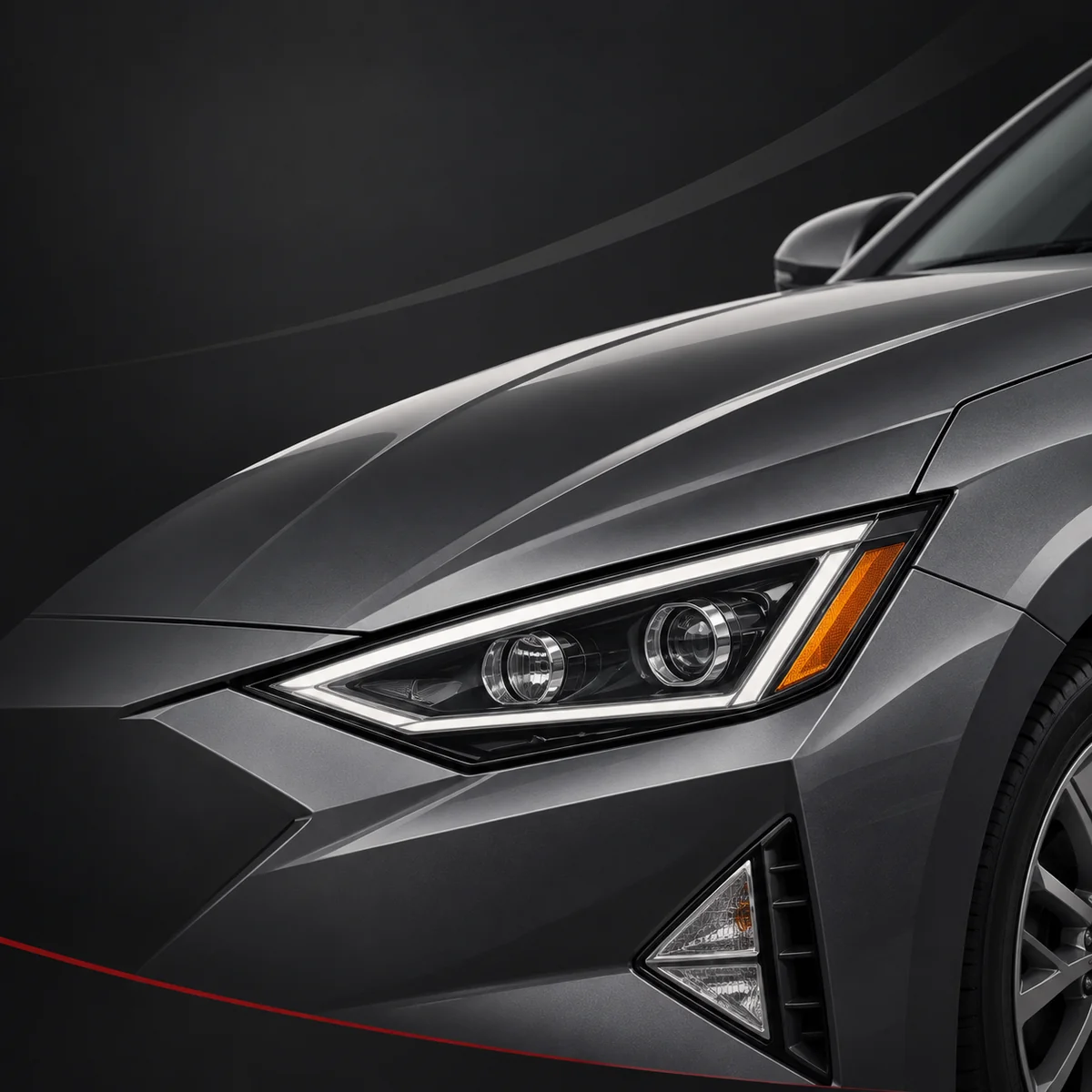 Close-up of a gray sedan's headlight