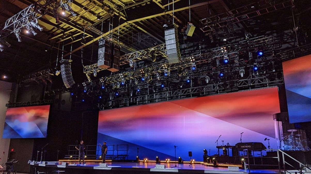 Church worship stage with line array speakers, stage lighting and LED video walls