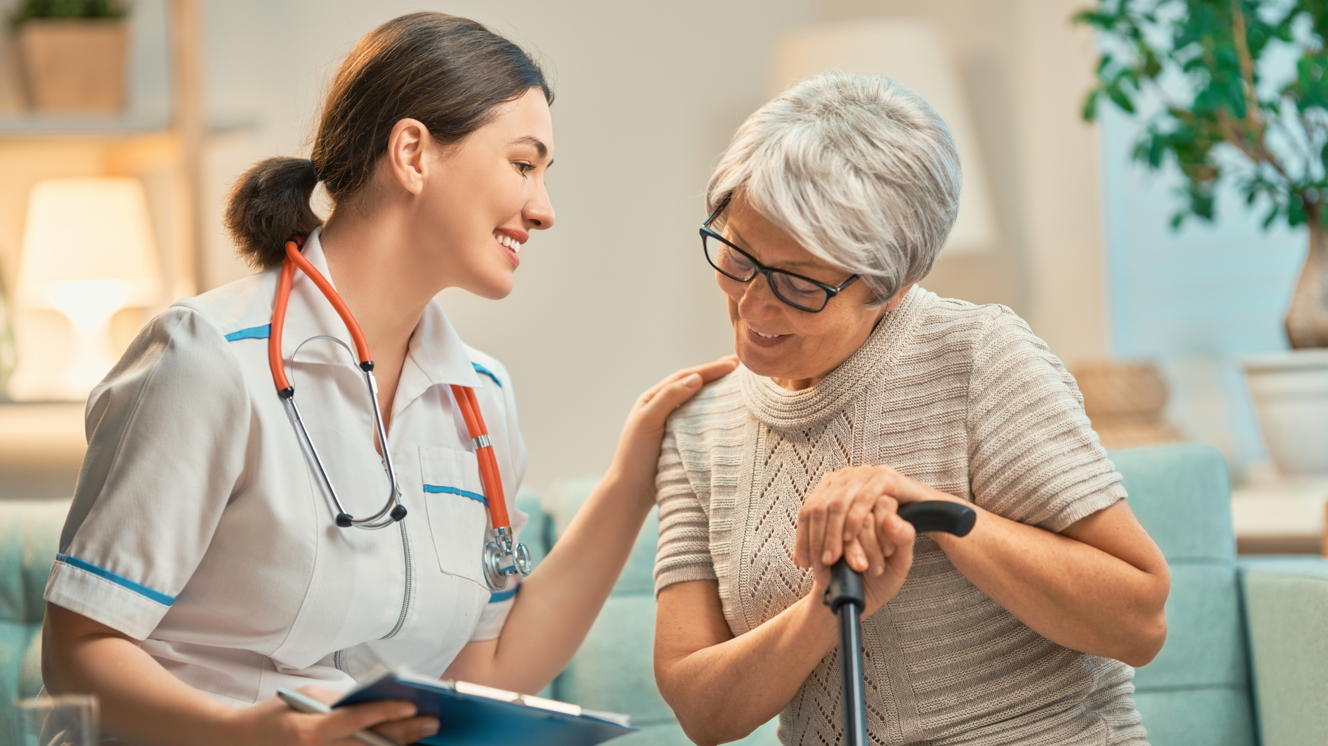 caregiver managing medication for patient after hospital discharge