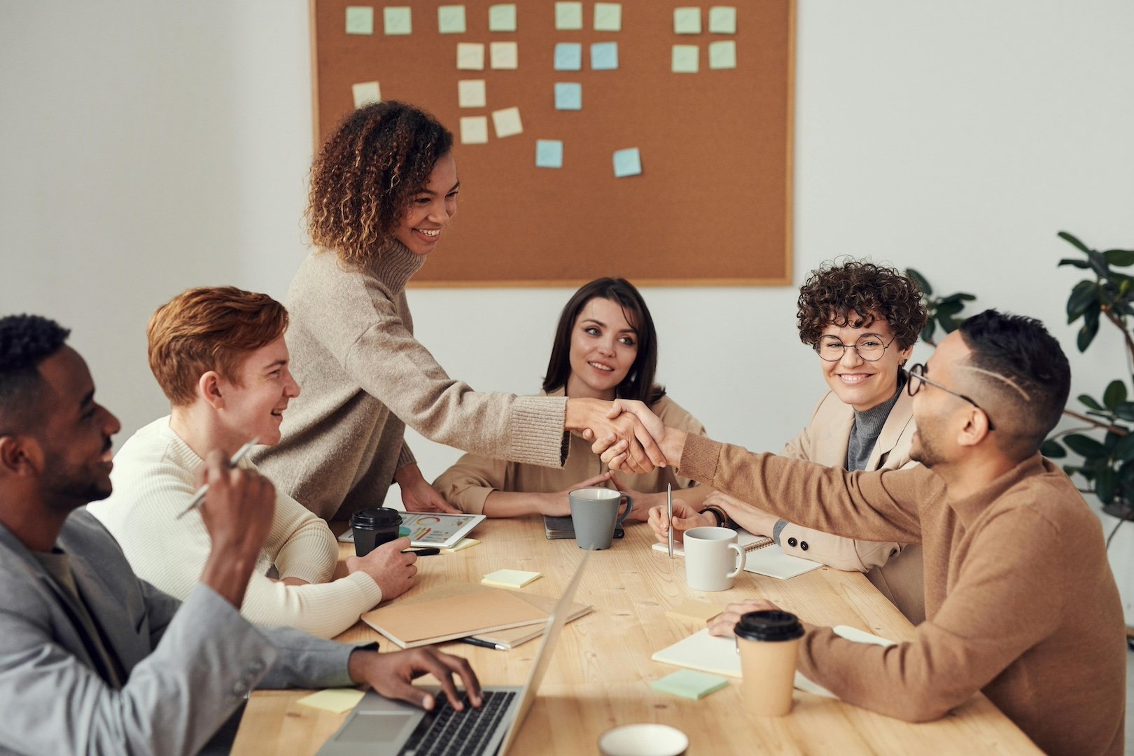 Team collaborating around a meeting table