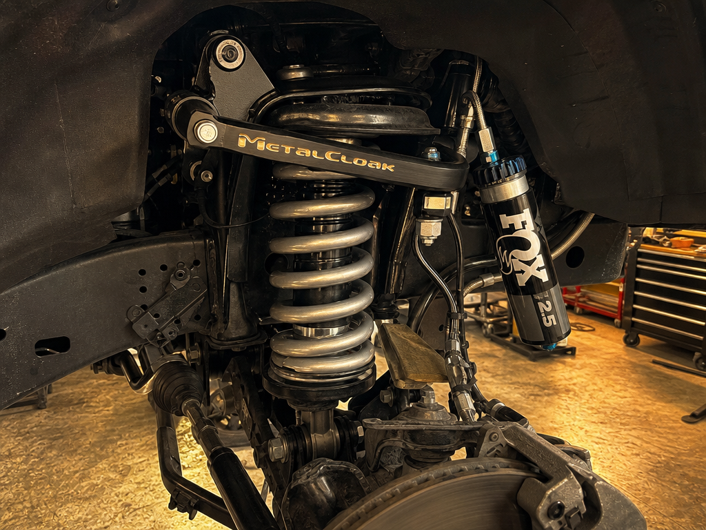 Metal Cloak UCA and Fox 2.5 coilover installed on JL Wrangler front suspension