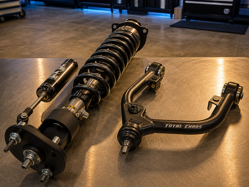 Toyota 4Runner front coilover and upper control arm on a shop hoist