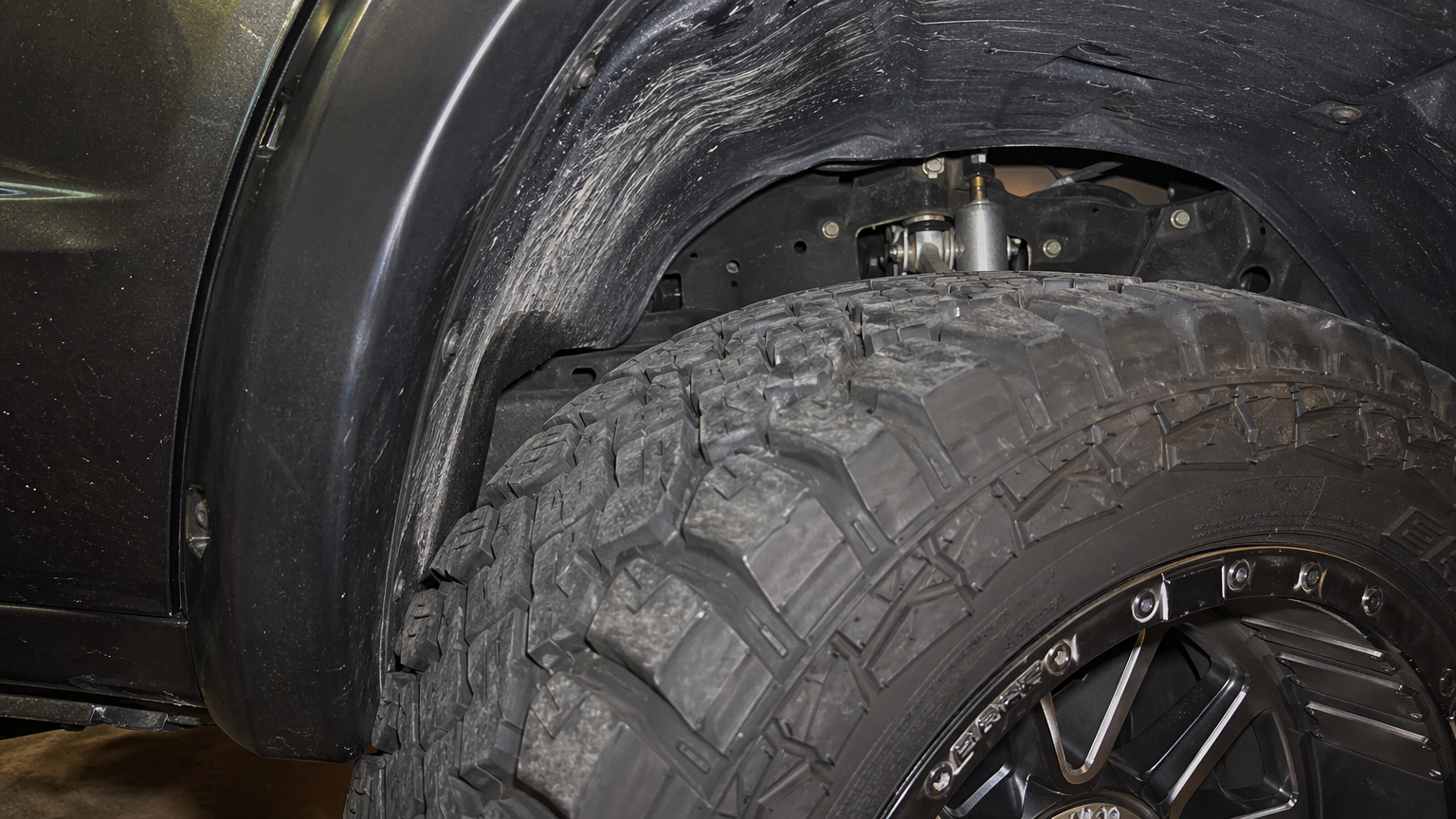 Truck tire rubbing inner fender liner from incorrect wheel offset