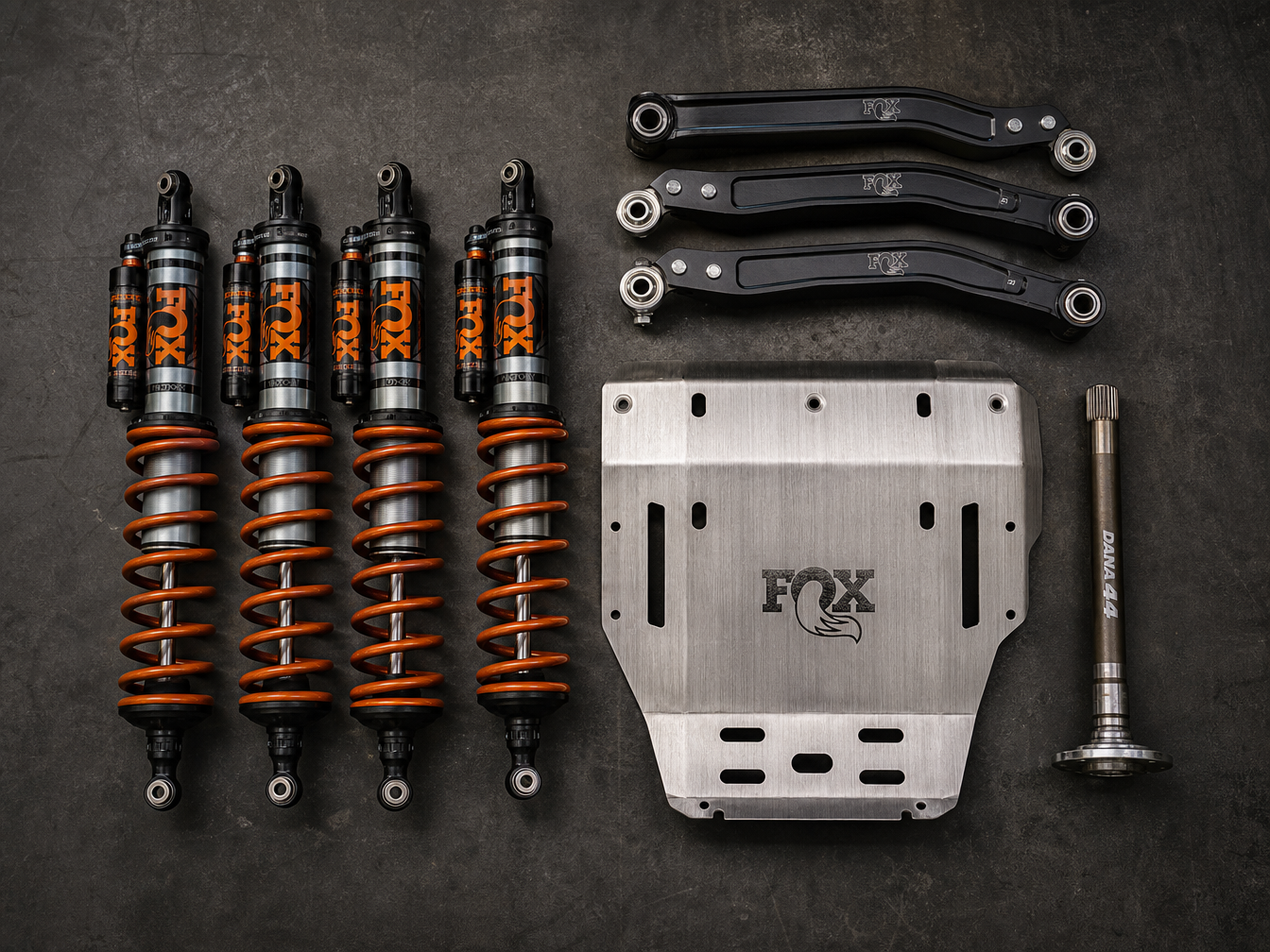 Premium 4x4 suspension components — Fox coilovers, chromoly control arms, skid plate