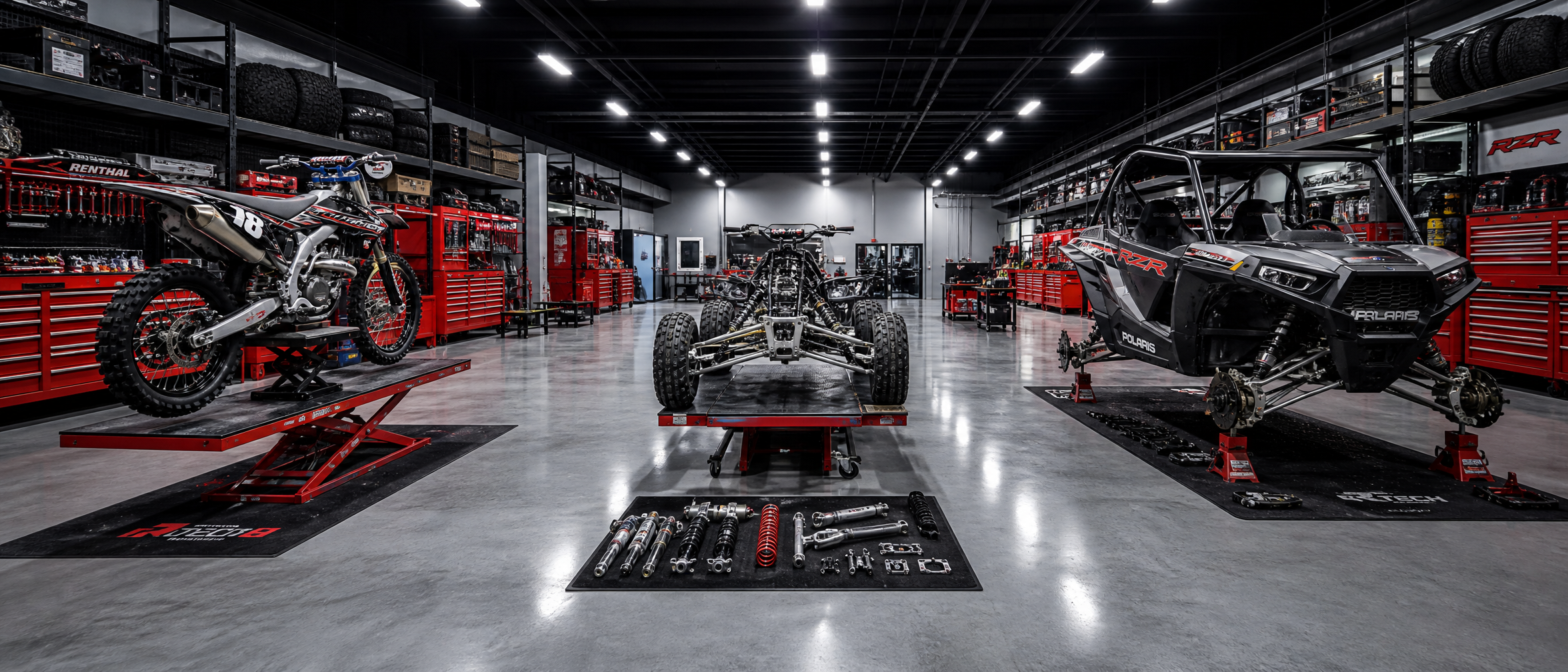 Powersports shop interior with mixed builds
