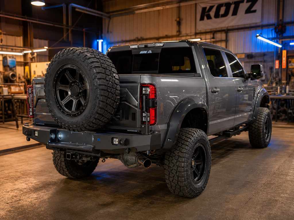 Custom rear bumper with swing-out tire carrier at the shop